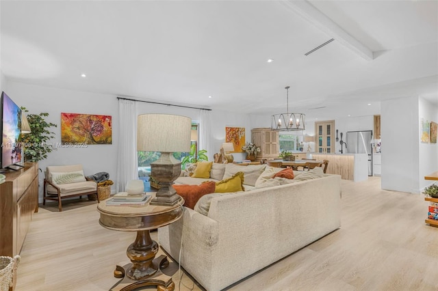7560 SW 144th St, Palmetto Bay, FL 33158 - living room featuring light wood-style flooring, a notable chandelier, recessed lighting, and beam ceiling