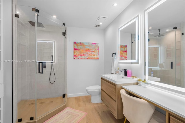 7560 SW 144th St, Palmetto Bay, FL 33158 - bathroom featuring toilet, wood finished floors, baseboards, a shower stall, and vanity