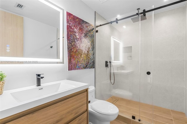 7560 SW 144th St, Palmetto Bay, FL 33158 - bathroom with vanity, toilet, visible vents, and a shower stall