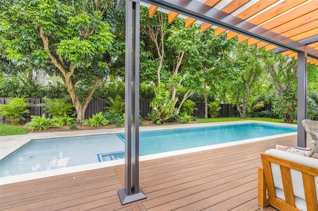 7560 SW 144th St, Palmetto Bay, FL 33158 - view of swimming pool with a deck, a fenced in pool, and a fenced backyard