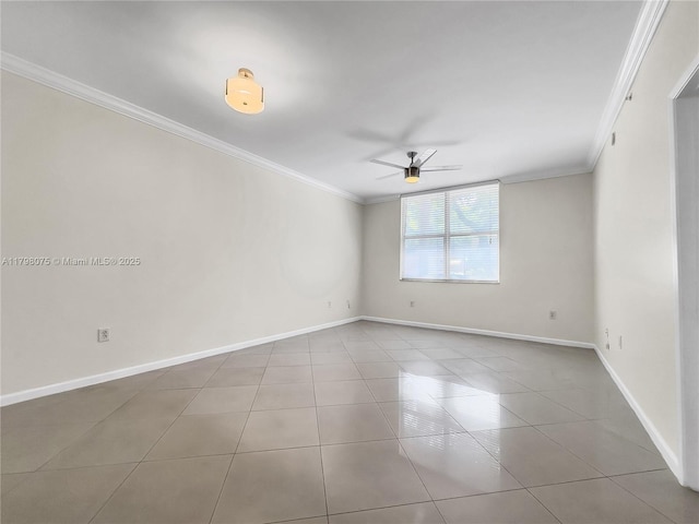 spare room featuring crown molding, baseboards, a ceiling fan, and tile patterned floors