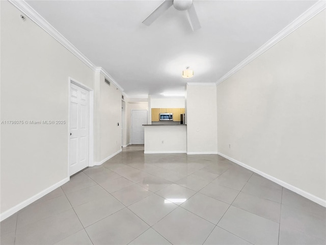 unfurnished living room featuring a ceiling fan, crown molding, visible vents, baseboards, and light tile patterned flooring