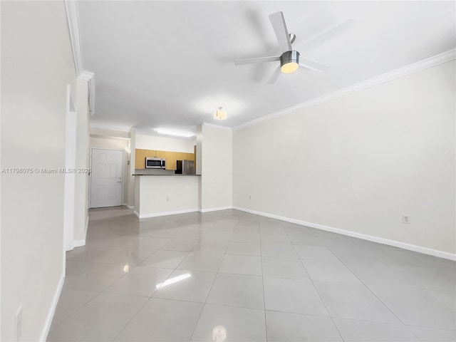unfurnished living room with ceiling fan, light tile patterned floors, baseboards, and ornamental molding
