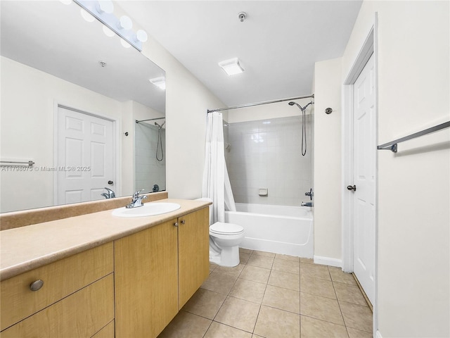 bathroom with toilet, vanity, shower / tub combo with curtain, tile patterned floors, and baseboards