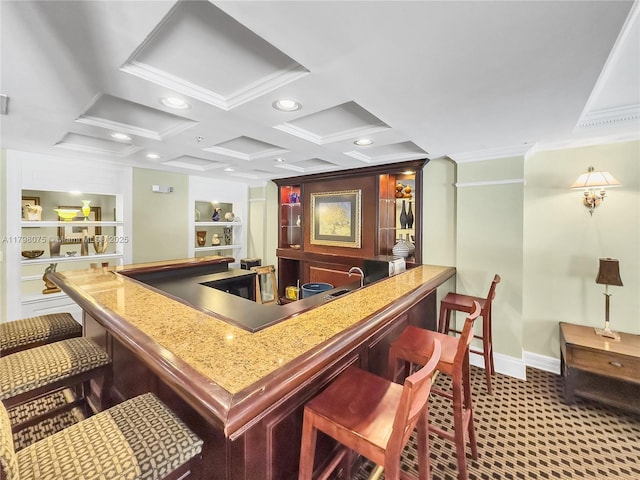 bar with indoor wet bar, coffered ceiling, baseboards, ornamental molding, and recessed lighting