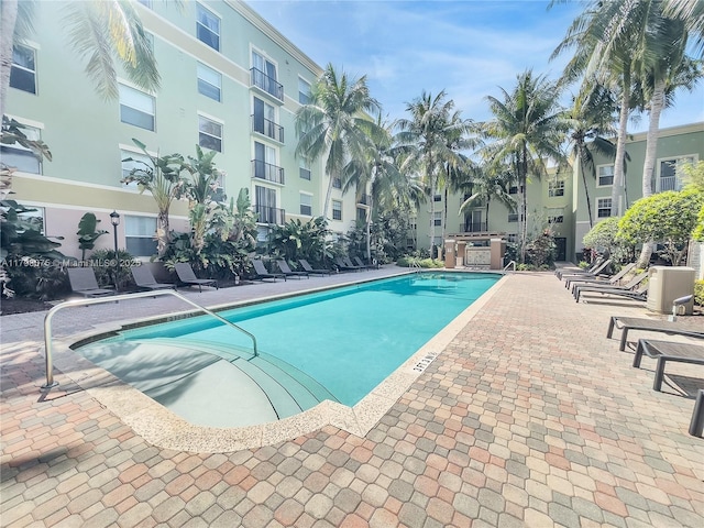 community pool featuring a patio