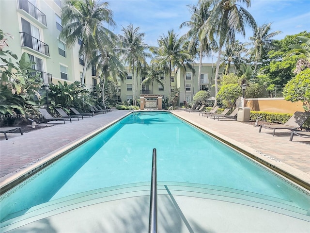 pool with a patio