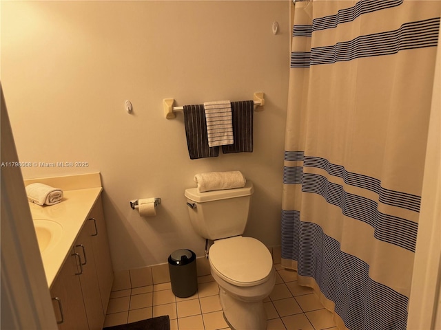 185 SE 14th Ter Unit 1812, Miami, FL 33131 - full bathroom featuring tile patterned floors, vanity, toilet, baseboards, and a shower with shower curtain