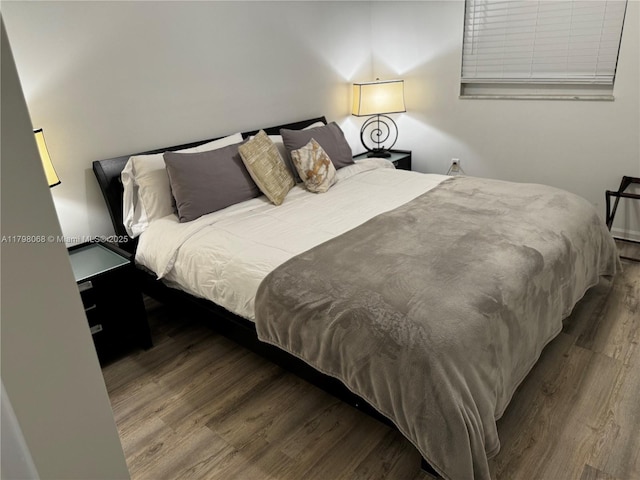185 SE 14th Ter Unit 1812, Miami, FL 33131 - bedroom featuring wood finished floors