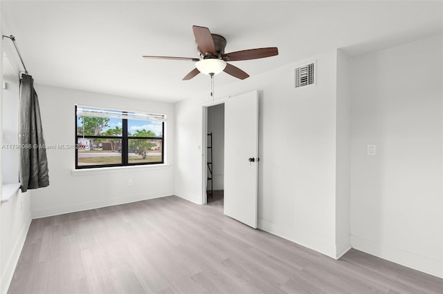 1100 N 31st Ct, Hollywood, FL 33021 - spare room featuring wood finished floors, ceiling fan, and baseboards