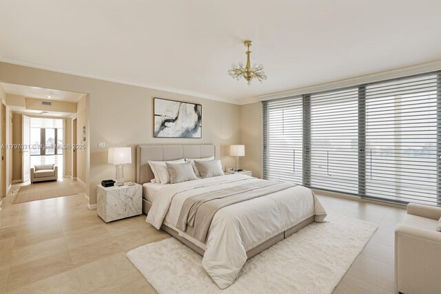 19667 Turnberry Way Unit 16Gr, Aventura, FL 33180 - bedroom featuring crown molding, access to exterior, light tile patterned floors, and a chandelier