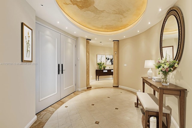 19667 Turnberry Way Unit 16Gr, Aventura, FL 33180 - entrance foyer with recessed lighting, a tray ceiling, baseboards, and inlaid floor details