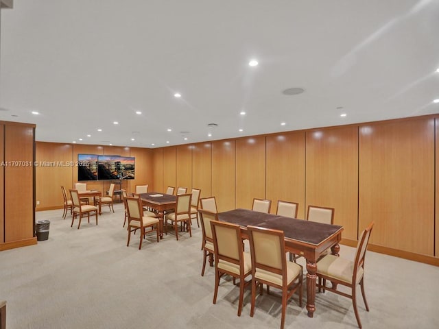 dining area featuring light colored carpet and recessed lighting