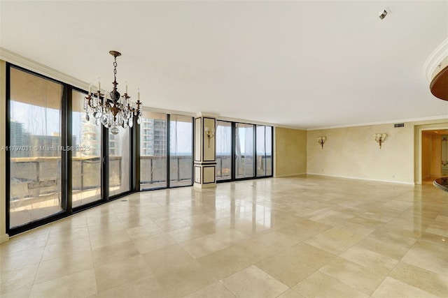 19667 Turnberry Way Unit 16Gr, Aventura, FL 33180 - spare room featuring crown molding, plenty of natural light, a chandelier, baseboards, and light tile patterned floors