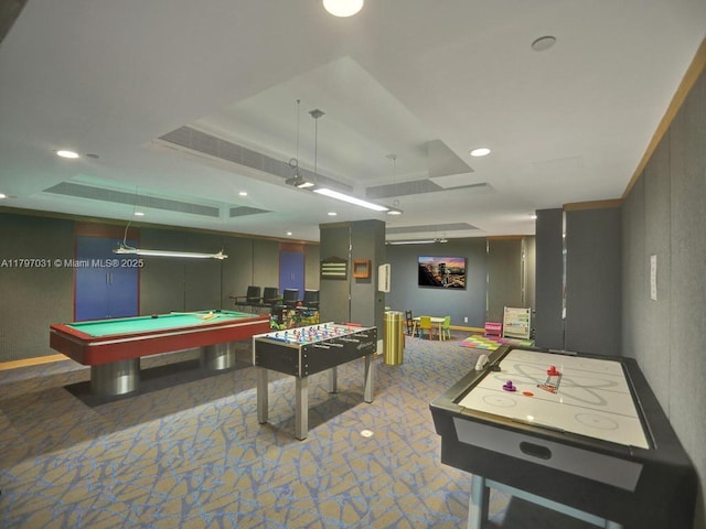 playroom with a tray ceiling, recessed lighting, and pool table