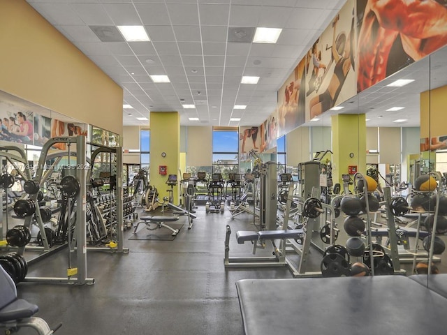 exercise room with a drop ceiling