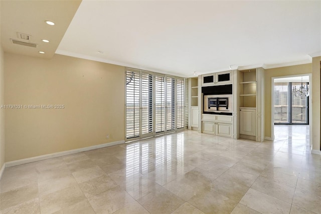 19667 Turnberry Way Unit 16Gr, Aventura, FL 33180 - unfurnished living room with crown molding, recessed lighting, baseboards, built in features, and a chandelier