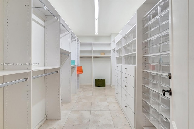 19667 Turnberry Way Unit 16Gr, Aventura, FL 33180 - walk in closet featuring light tile patterned flooring
