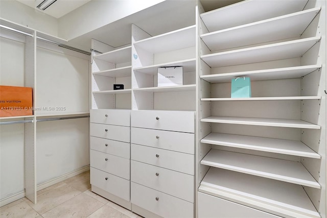 19667 Turnberry Way Unit 16Gr, Aventura, FL 33180 - spacious closet featuring light tile patterned floors