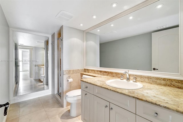 19667 Turnberry Way Unit 16Gr, Aventura, FL 33180 - full bathroom featuring toilet, vanity, tile patterned flooring, a stall shower, and recessed lighting