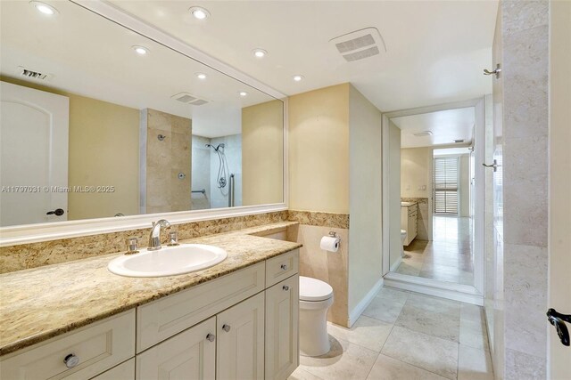 19667 Turnberry Way Unit 16Gr, Aventura, FL 33180 - full bath featuring toilet, vanity, a shower, recessed lighting, and tile patterned floors