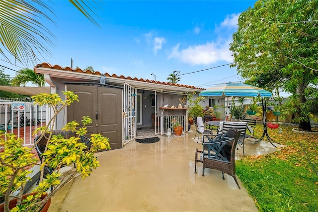 view of patio / terrace with fence