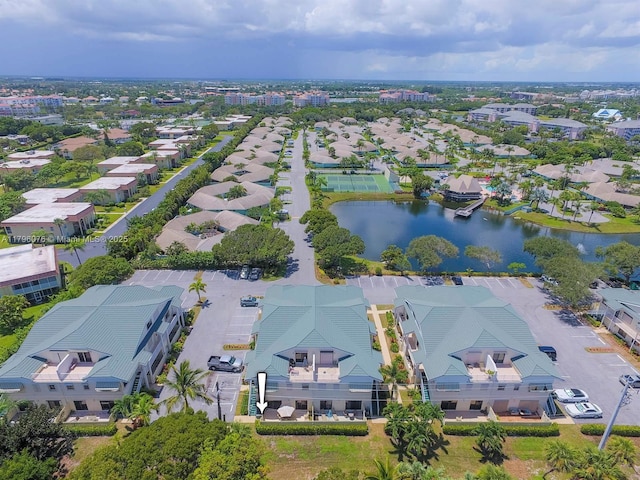 bird's eye view with a water view and a residential view