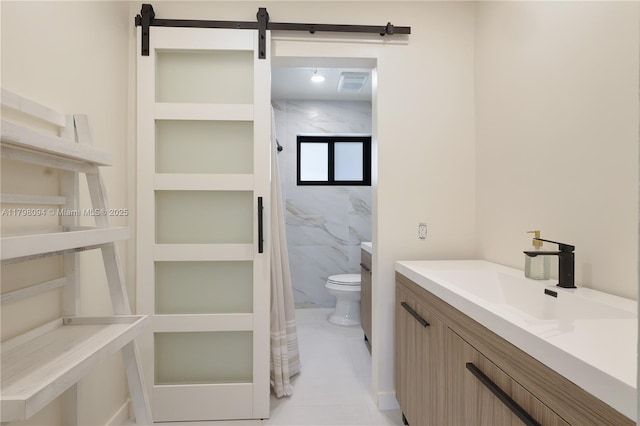 full bath featuring toilet, vanity, and a marble finish shower
