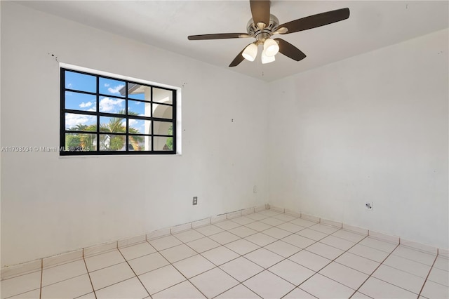 spare room with a ceiling fan