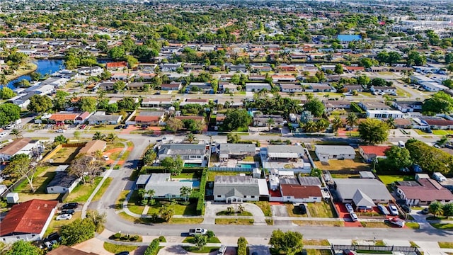 aerial view of residential area with a nearby body of water