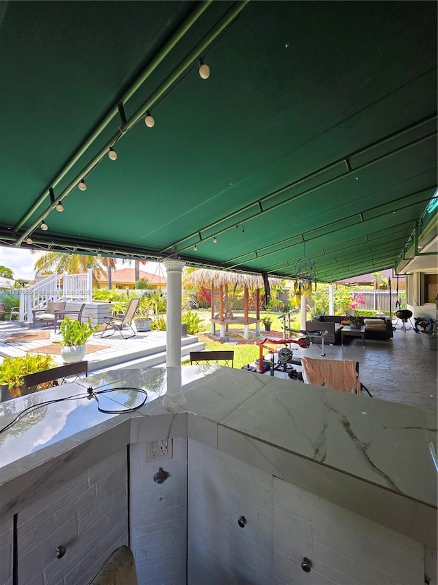 view of patio / terrace with fence