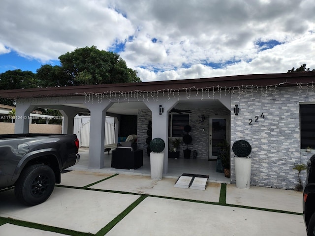224 E 42nd St, Hialeah, FL 33013 - rear view of house with a patio