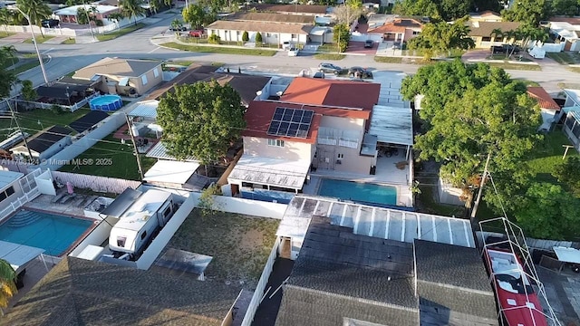 224 E 42nd St, Hialeah, FL 33013 - aerial perspective of suburban area with a pool