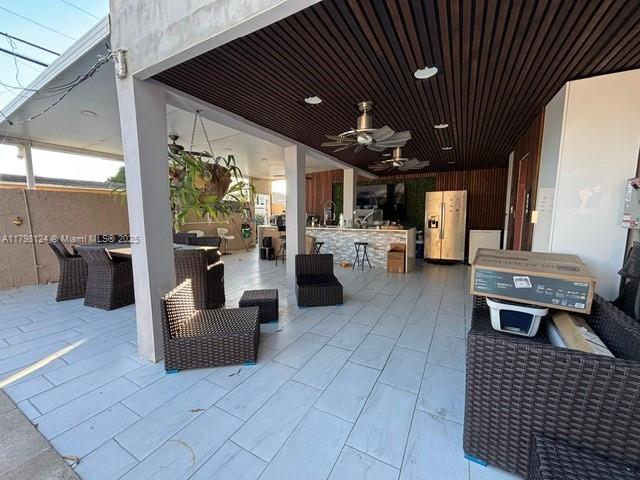 224 E 42nd St, Hialeah, FL 33013 - view of patio featuring ceiling fan