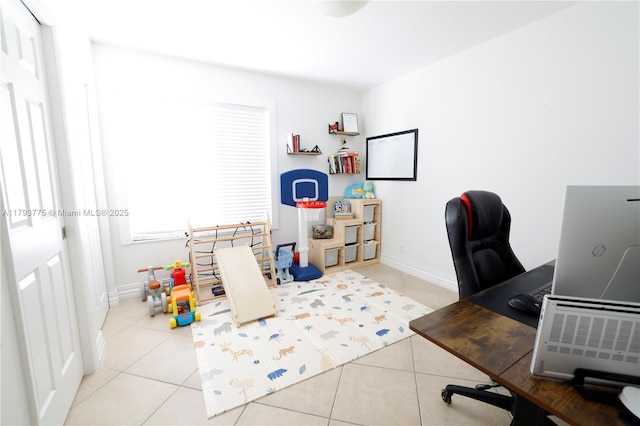 tiled office featuring baseboards