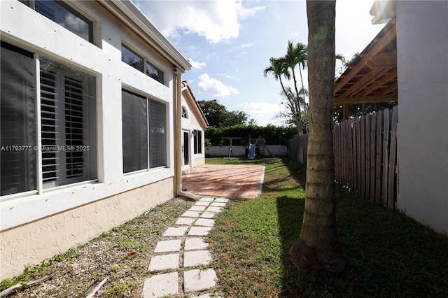 view of yard with fence