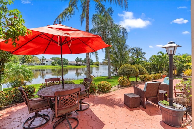 631 NW 205th Ave, Pembroke Pines, FL 33029 - view of patio featuring outdoor dining area and a water view