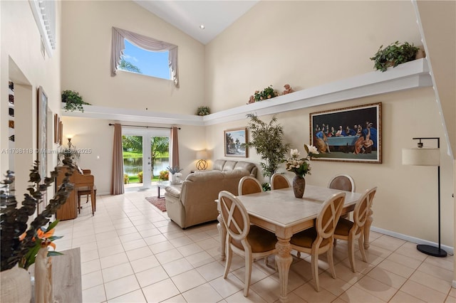 631 NW 205th Ave, Pembroke Pines, FL 33029 - dining space featuring french doors, light tile patterned flooring, and high vaulted ceiling