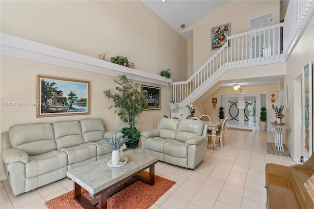631 NW 205th Ave, Pembroke Pines, FL 33029 - living room with light tile patterned floors, stairs, and high vaulted ceiling