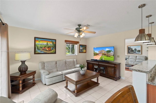 631 NW 205th Ave, Pembroke Pines, FL 33029 - living room with baseboards, ceiling fan, visible vents, and light tile patterned flooring