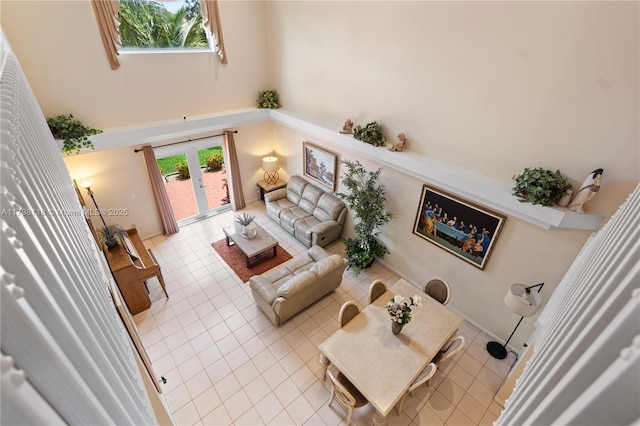 631 NW 205th Ave, Pembroke Pines, FL 33029 - tiled living area with french doors and a high ceiling