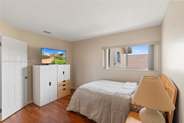 631 NW 205th Ave, Pembroke Pines, FL 33029 - bedroom featuring visible vents and wood finished floors