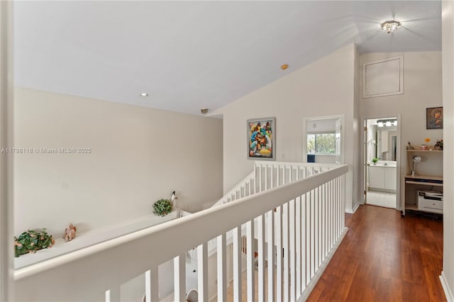 631 NW 205th Ave, Pembroke Pines, FL 33029 - hallway featuring lofted ceiling, wood finished floors, an upstairs landing, recessed lighting, and baseboards