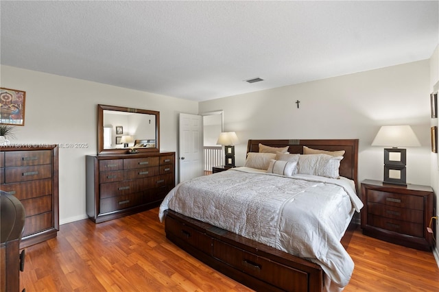 631 NW 205th Ave, Pembroke Pines, FL 33029 - bedroom featuring visible vents and wood finished floors