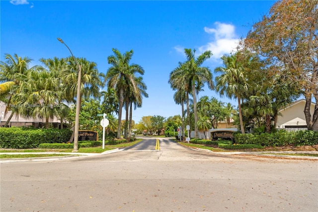 631 NW 205th Ave, Pembroke Pines, FL 33029 - view of road with traffic signs, sidewalks, street lights, and curbs