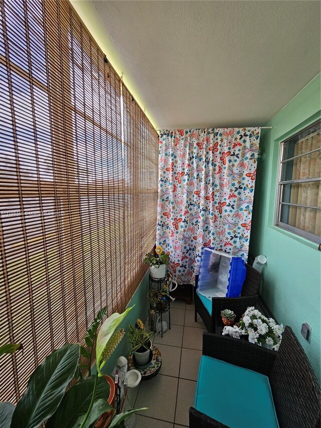 view of patio with a balcony