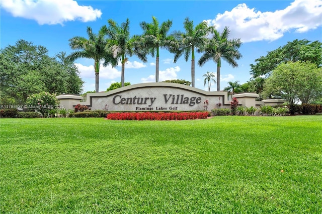 community sign with a lawn