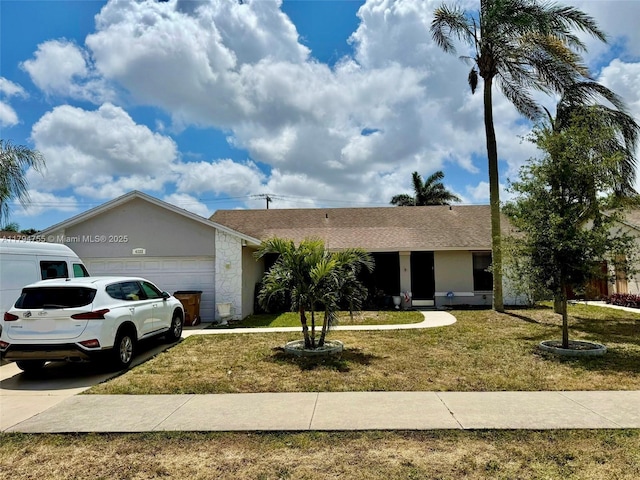 4222 NW 6th Ct, Deerfield Beach, FL 33442 - ranch-style house featuring a front yard, a shingled roof, an attached garage, and driveway