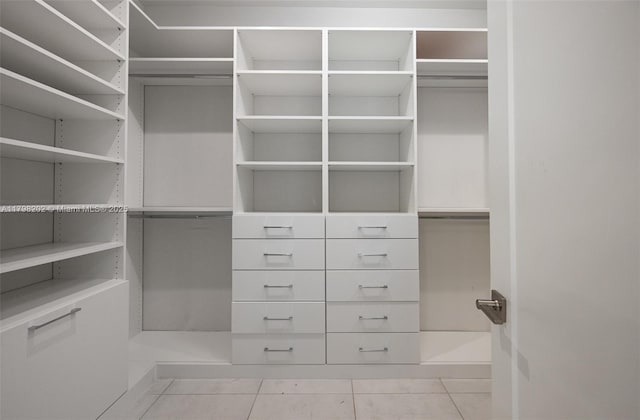 walk in closet featuring tile patterned floors