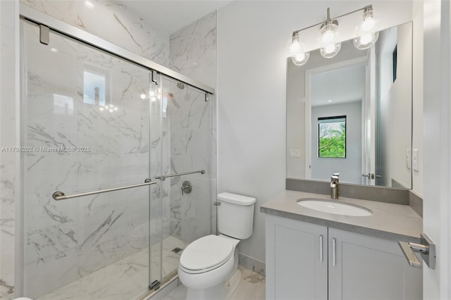 bathroom featuring vanity, toilet, a marble finish shower, and marble finish floor